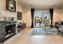 Modern ground floor apartment in sought-after complex