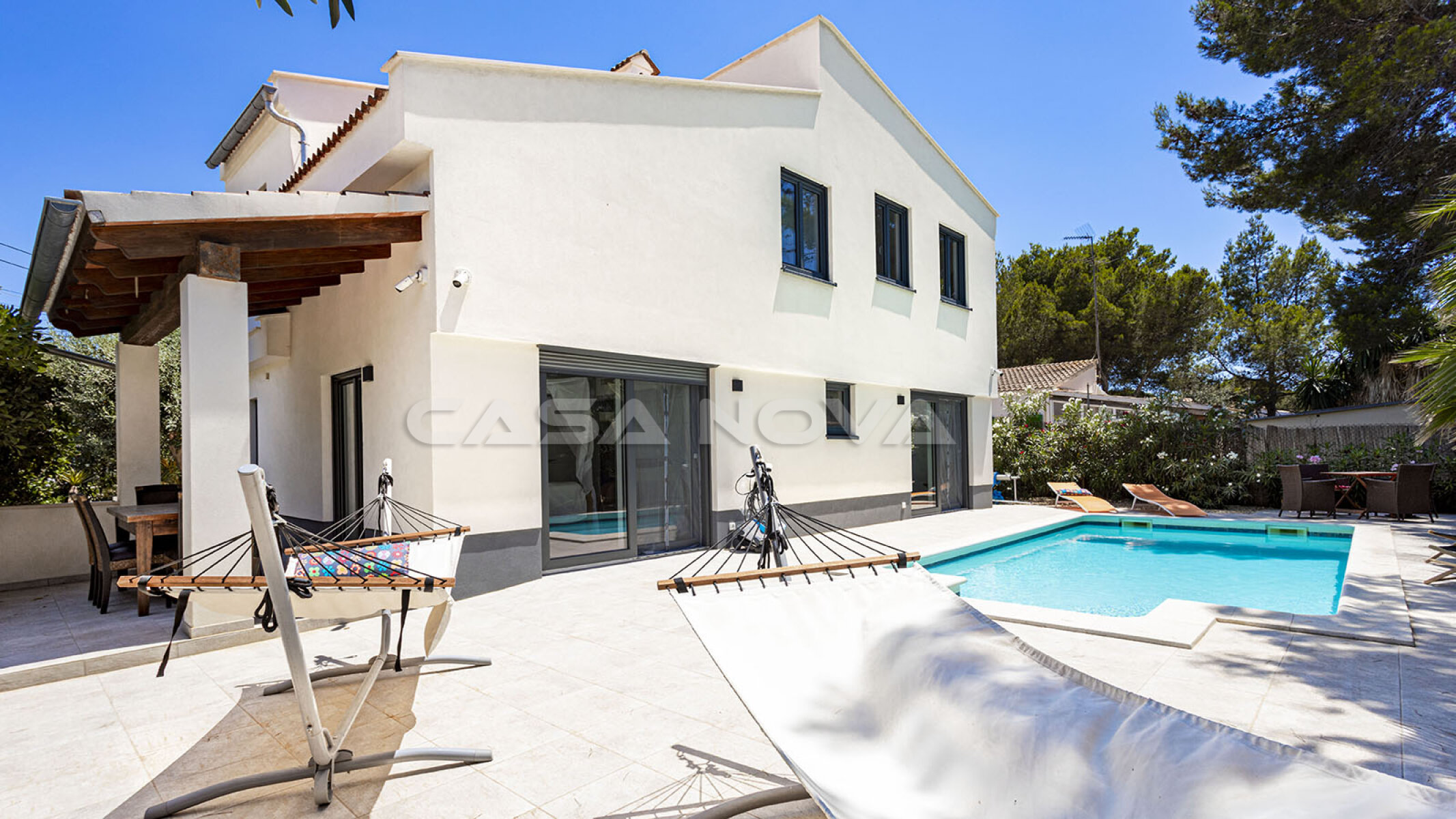 Modern villa with several terraces and pool